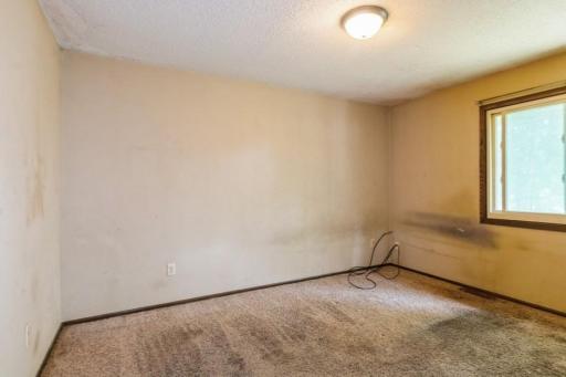 08_7181-Colorado-Ave-N_Primary-Bedroom_Web.jpg