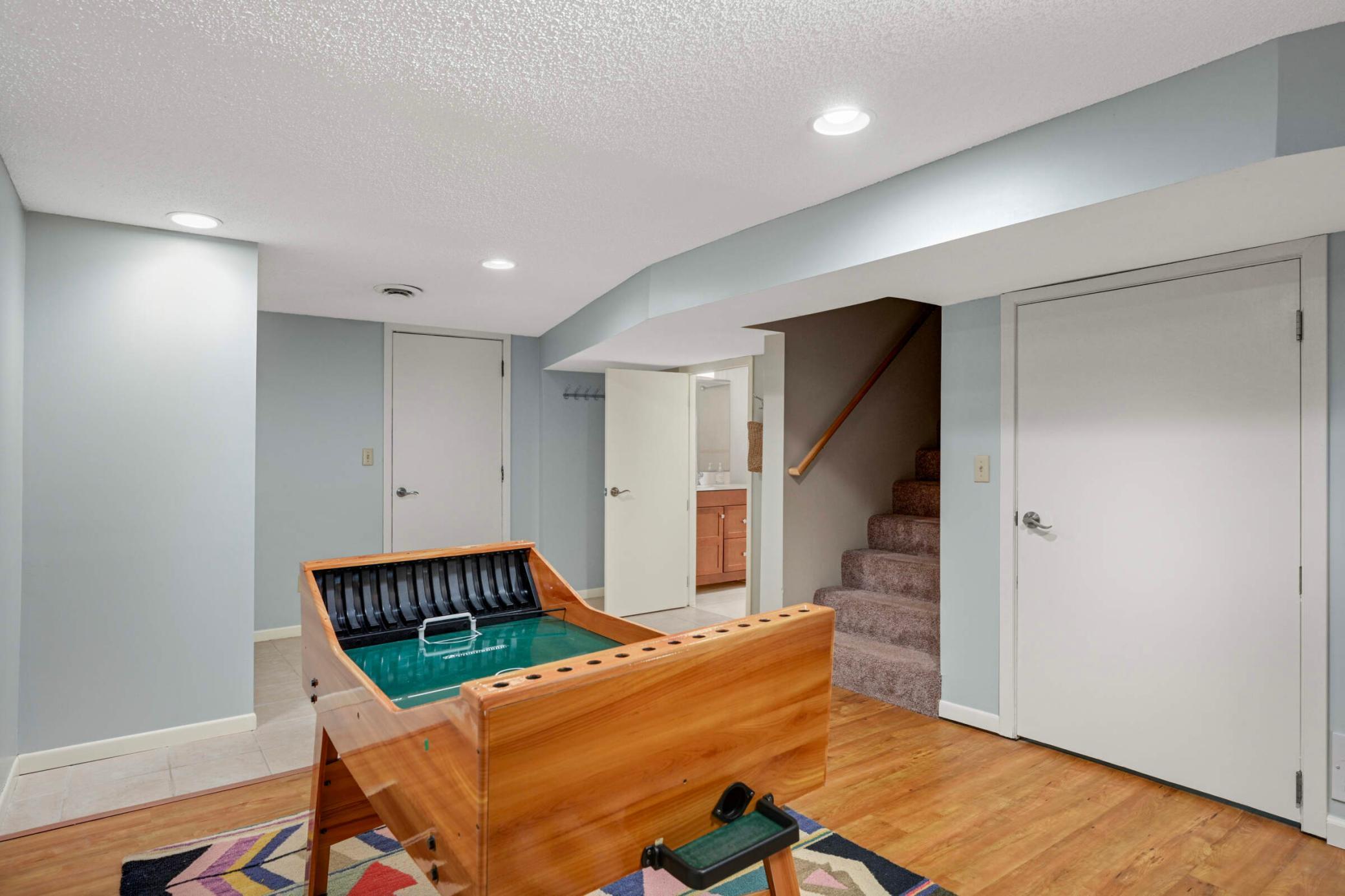 Game room area in the lower level would also make a terrific space for a family office and homework station.
