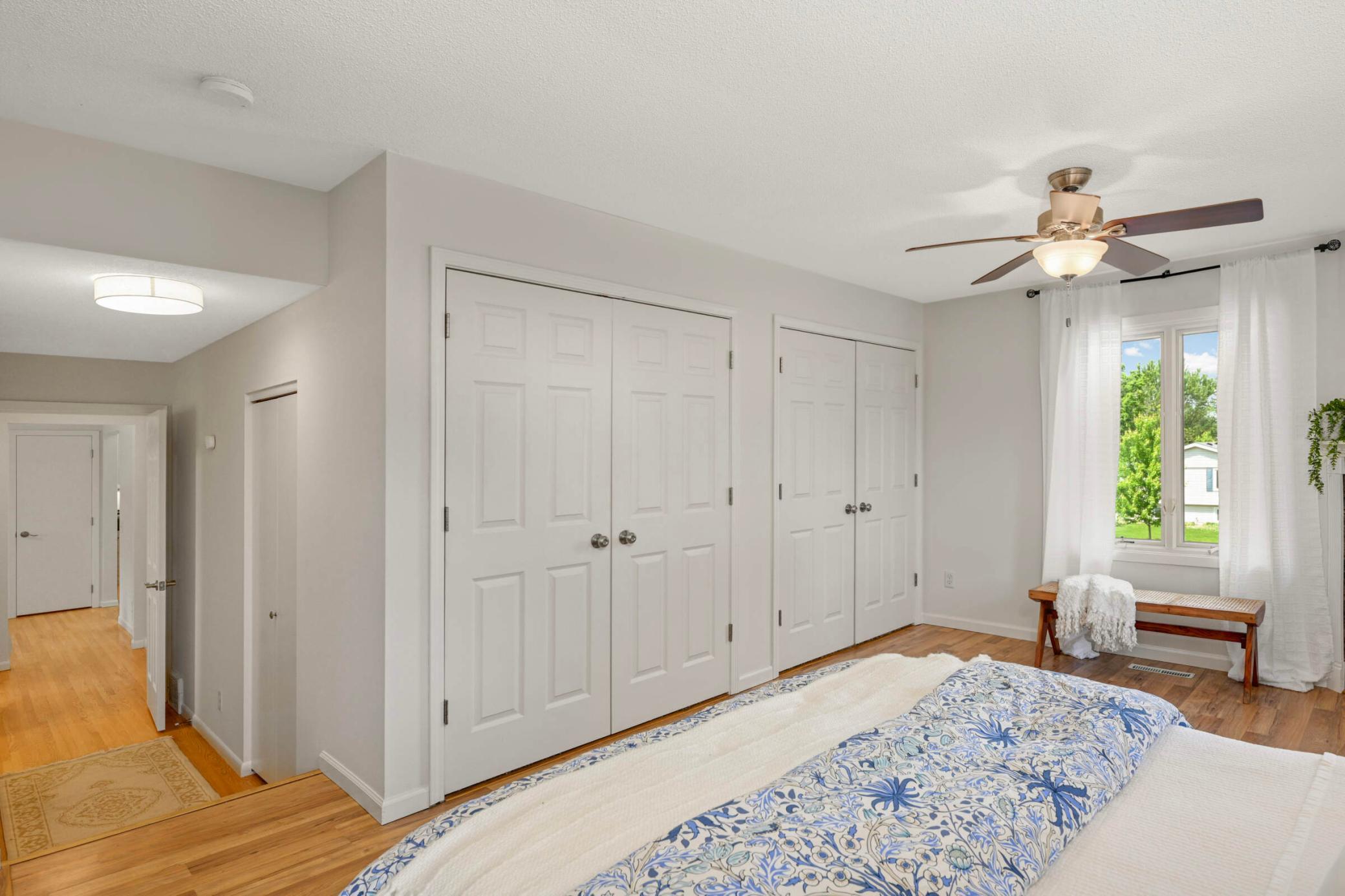 Three separate closets, two of which feature built in shelving for added organization.