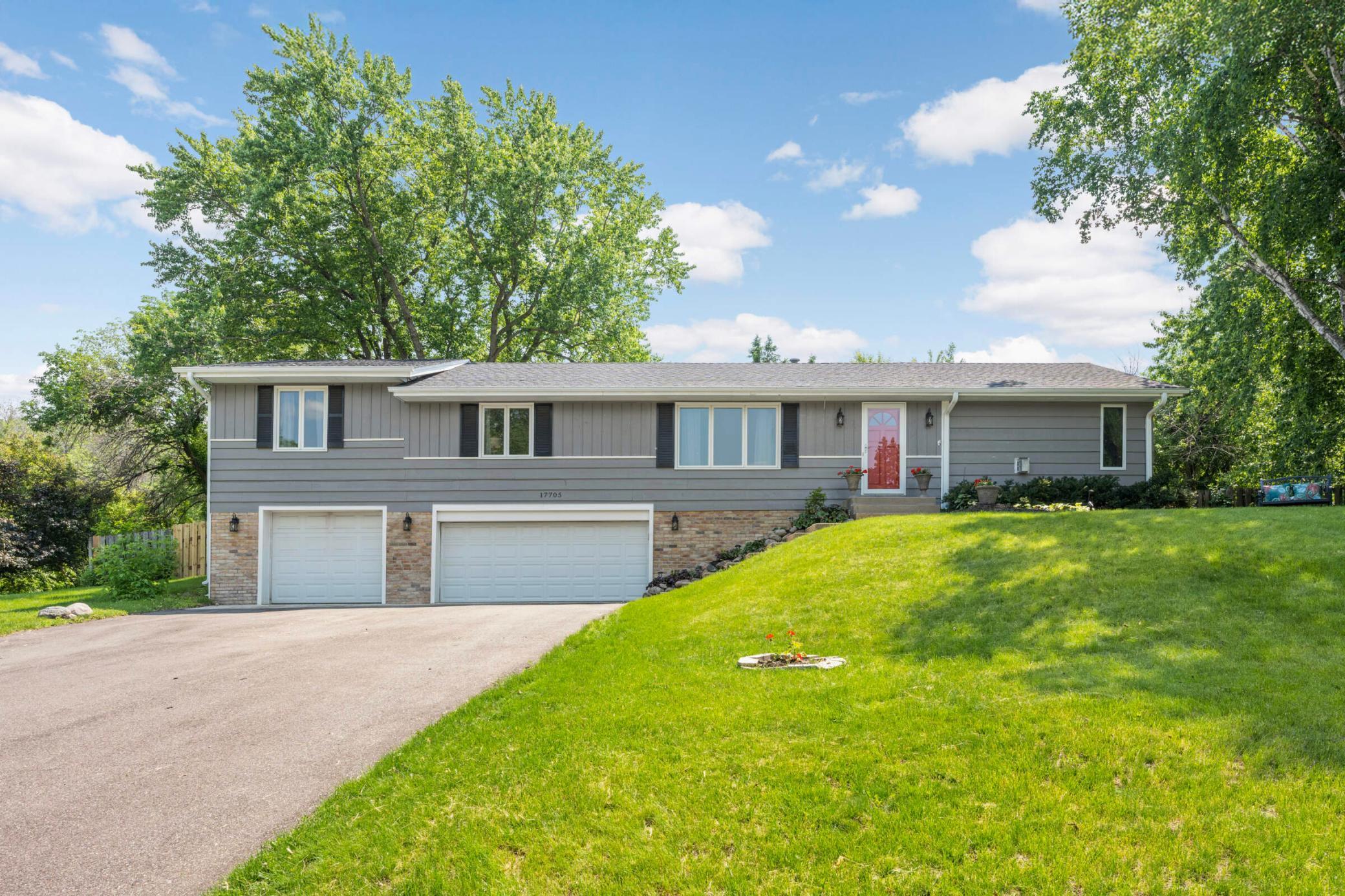 You will love the convenience of the tuck-under 3 car garage.