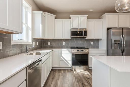 (Photos of a similar home, finishes may vary slightly!) Welcome to the Bristol!