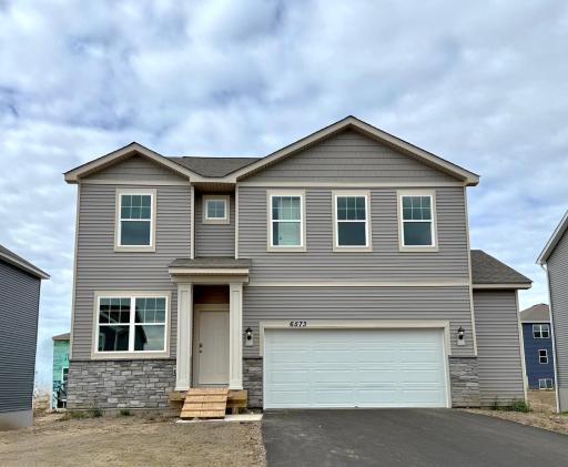 Welcome to the Holcombe! This is a photo of the actual home for sale.