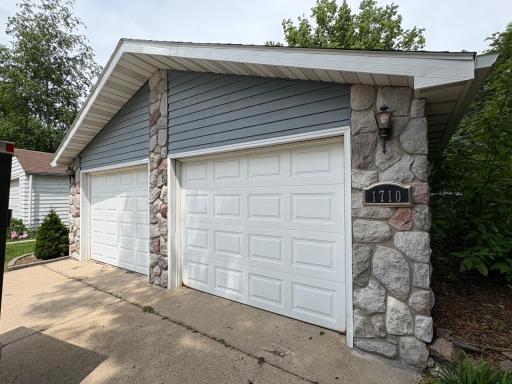 Garage on west side of property. Driveway facing South