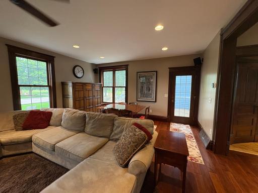 Patio door leads to large deck in the back of the home