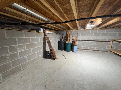 Clean and DRY Crawl space. Extra woodwork left for future projects