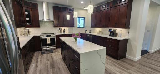 Kitchen has this great center island for more workspace