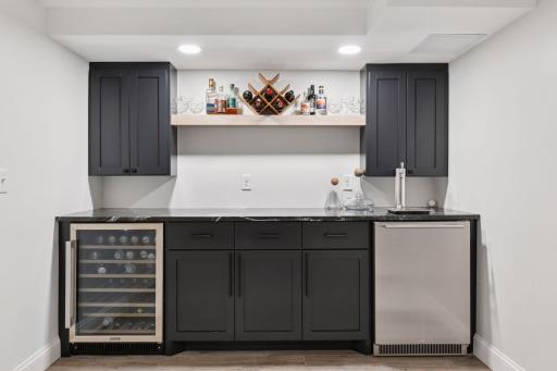 Custom cabinets, wine fridge and kegerator