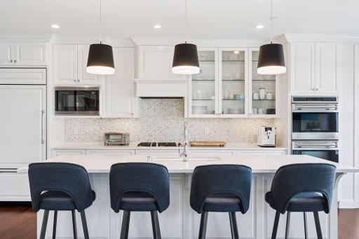 Center island is ideal for meal prep, entertaining, or grabbing a quick bite at the counter