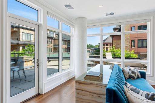 Easily access the corner wrap-around deck from the living spaces.