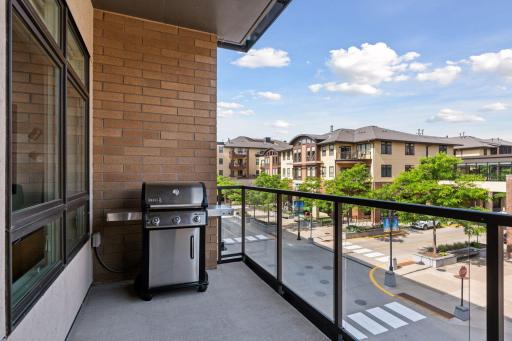 Outdoor spaces include this balcony located off the kitchen