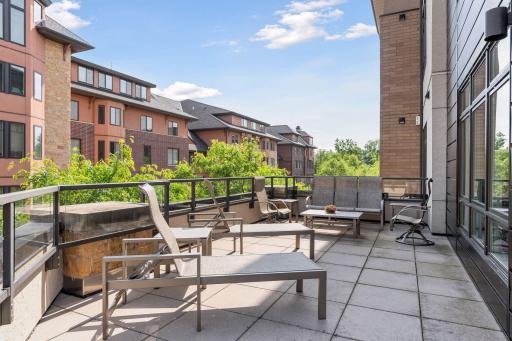 Additional gathering area on the spacious balcony patio
