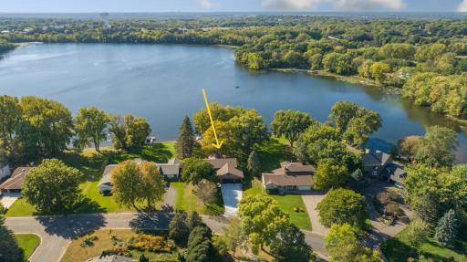 WEST facing SUNSET VIEWS every evening overlooking100 FT of LAKEFRONT on ROGERS LAKE. 1.6 ACRE LOT with extensive landscape-boulder walls, flowering trees & perennials galore! Complete interior & exterior renovation. completed January 2024.