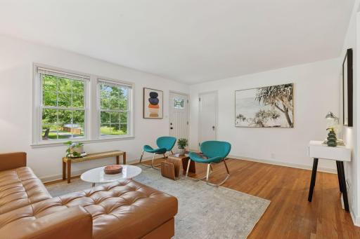 Front entry with spacious coat closet and views of mature trees and landscaping.