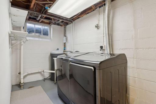 Newer washer and dryer stay with the home.