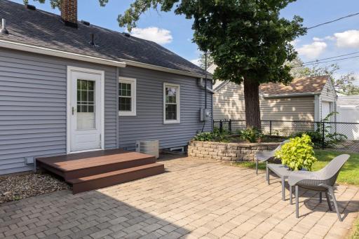 Paver patio opens to the kitchen, for easy entertaining and dining outdoors.