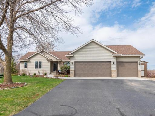 Charming walkout rambler with 3-car insulated garage, nestled on a quiet cul-de-sac in a prime Prior Lake location.
