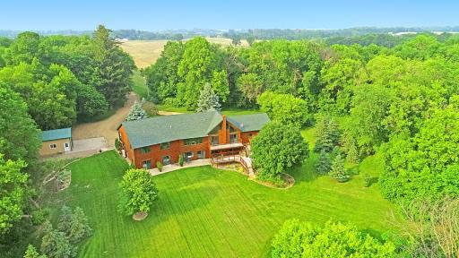 7458 39th Ave NE Garfield, MN one could describe it as a peaceful retreat nestled in nature—this aerial shot beautifully captures the charm of country living.