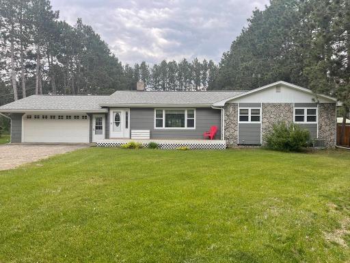 Beautiful three bedroom home with full bath and 1/2 bath.