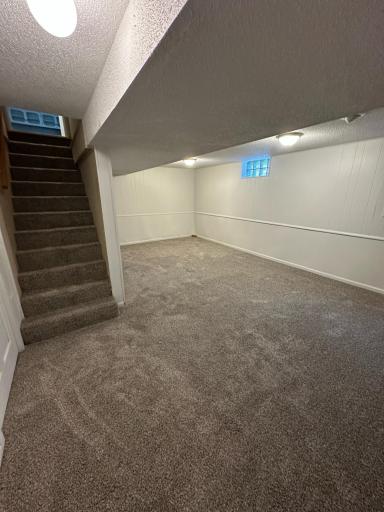 unit 1 basement bedroom (closet under stairs)