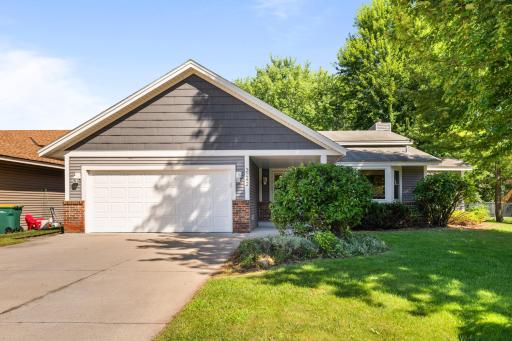 Welcome to 3242 Libby Lane - a unique Vadnais Heights gem with vaulted ceilings and a bright, open layout.