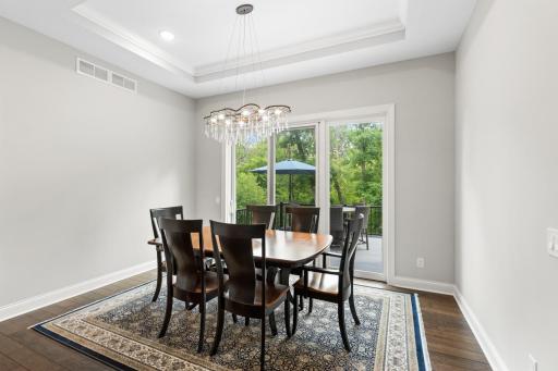 Access to deck from informal dining area.