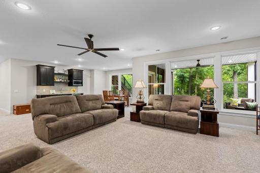Walkout to finished screened porch and beautiful patioâenjoy seamless indoor-outdoor living