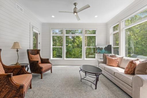 Serene sunroom overlooking the tranquil backyardâperfect for morning coffee or winding down.