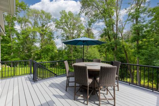 Vast outdoor deck ideal for grilling, relaxing, or hosting gatherings.