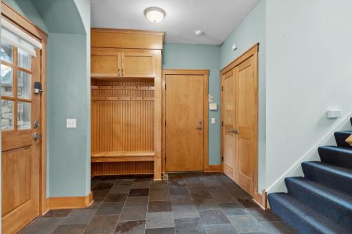 Main floor mudroom and laundry have rough-ins in-place for heated floors