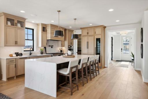 Savannah A - Photo is of like home and may not depict actual home plan. Configurations, features, materials and finishes may contain options that are not included in the price.