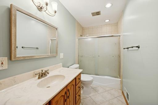 Updated full bathroom with new stool and faucet.