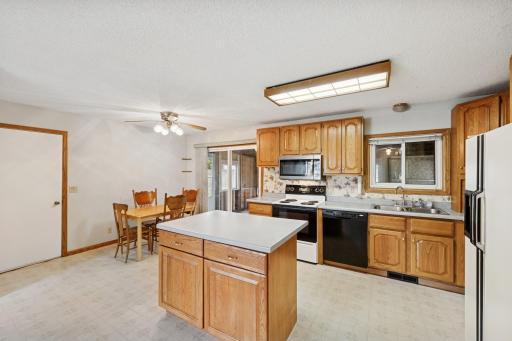 Step through doors, through porch to private deck for summer grilling.