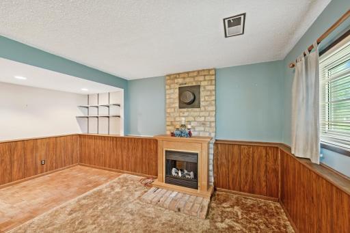 Lower level with family room, office/flex space and electric fireplace.