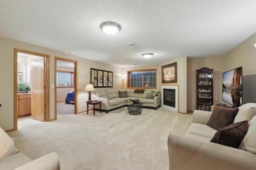 Lower level family room with gas fireplace