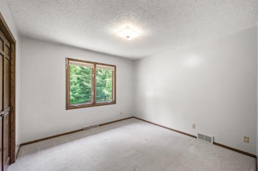 3 bedrooms on upper level with new carpet and paint.