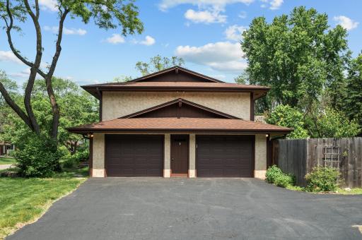 Garage features bonus workspace along with additional driveway parking stall.