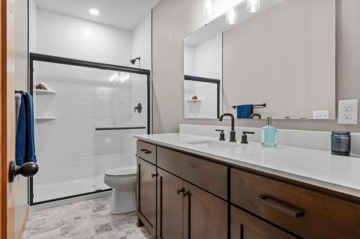 3/4 bath by the front entry/office