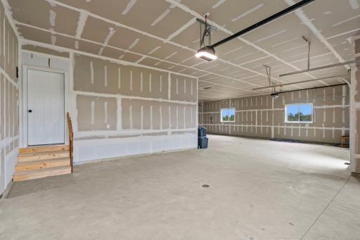 Garage is roughed in for a gas heater plus has 2 drains