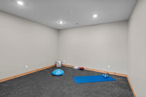 Who needs a gym membership! Plenty of space for multiple machines & weights