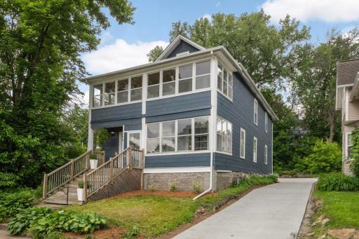 Beautiful Up-Down Duplex with enclosed porches on both levels!