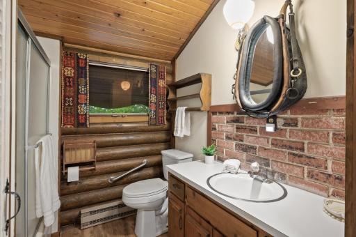 Upper level bathroom conveniently located near both bedrooms.