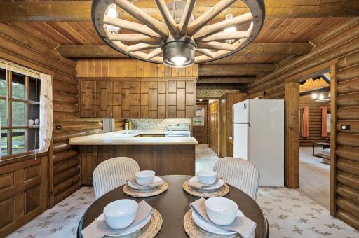 The peninsula provides additional casual seating and doubles as a convenient buffet space.