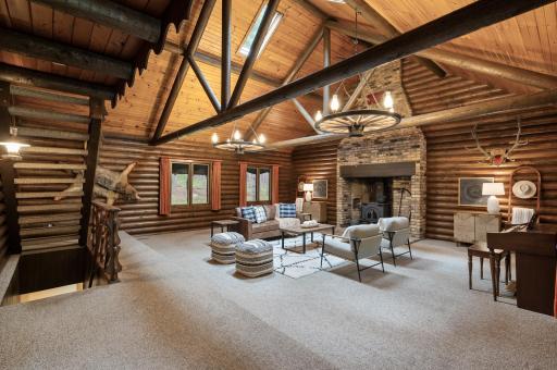This charming log home is nestled on over 6 acres of wooded land and boasts 4 bedrooms, 3 bathrooms, and over 2,700 finished square feet.