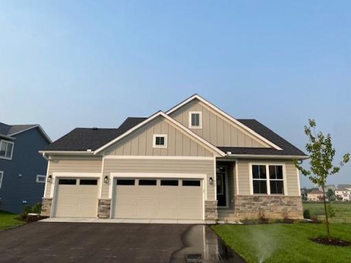 Move right into this Rambler our Robert Thomas Homes "Eveleth", Main floor living w/finished Basement Walkout! Over-sized 3-Car garage! Great yard and Views! Deck & Patio included (And Sod/grass, irrigation now installed!) Amazing Views!