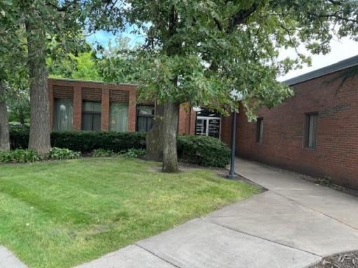 Brick-built office building includes reception area, kitchen, conference room(s), work center and 12 potential offices to fit your needs!