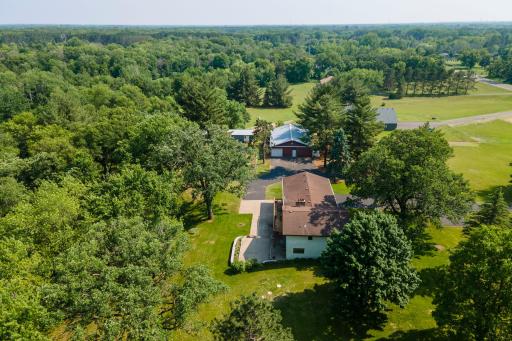 Aerial view looking south shows the larger pole building off to the south
