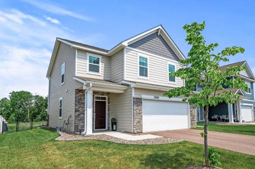 Enjoy close proximity to Maple Grove & Arbor Lakes while residing in this nature filled tranquil setting! This move in ready 2022 new construction home situated on a scenic pond features 3 bedrooms, 3 baths & many added upgrades throughout!