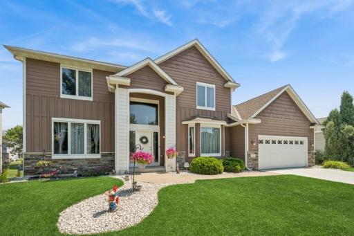 Located on a quiet circle with mature trees—peaceful living just minutes from everything.