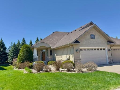With a spacious and convenient open floorplan, this luxury end-unit Eden Prairie townhome has all living facilities on one level, and an incredible lower level for entertaining or overnight guests.
