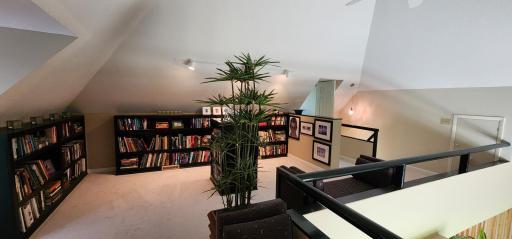 Lofted area looking over the livingroom.